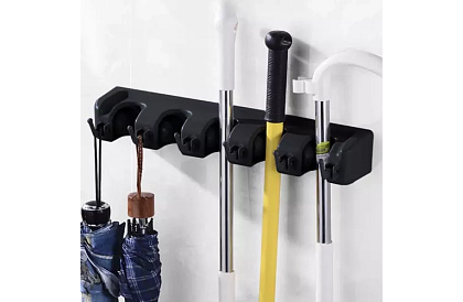 Nástenný držiak na záhradné náradie